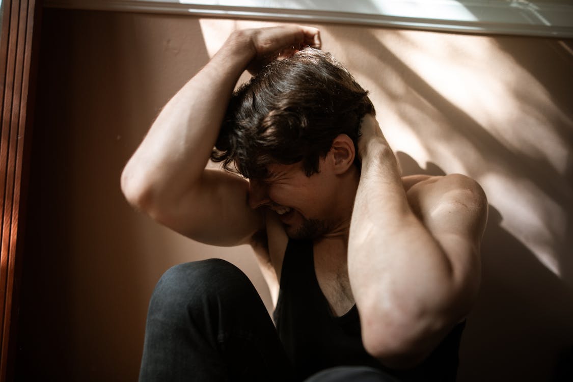 Photo by RDNE Stock project from Pexels: Distressed Young Man